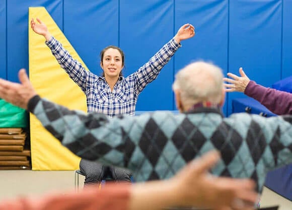 Student teaches health class to community members