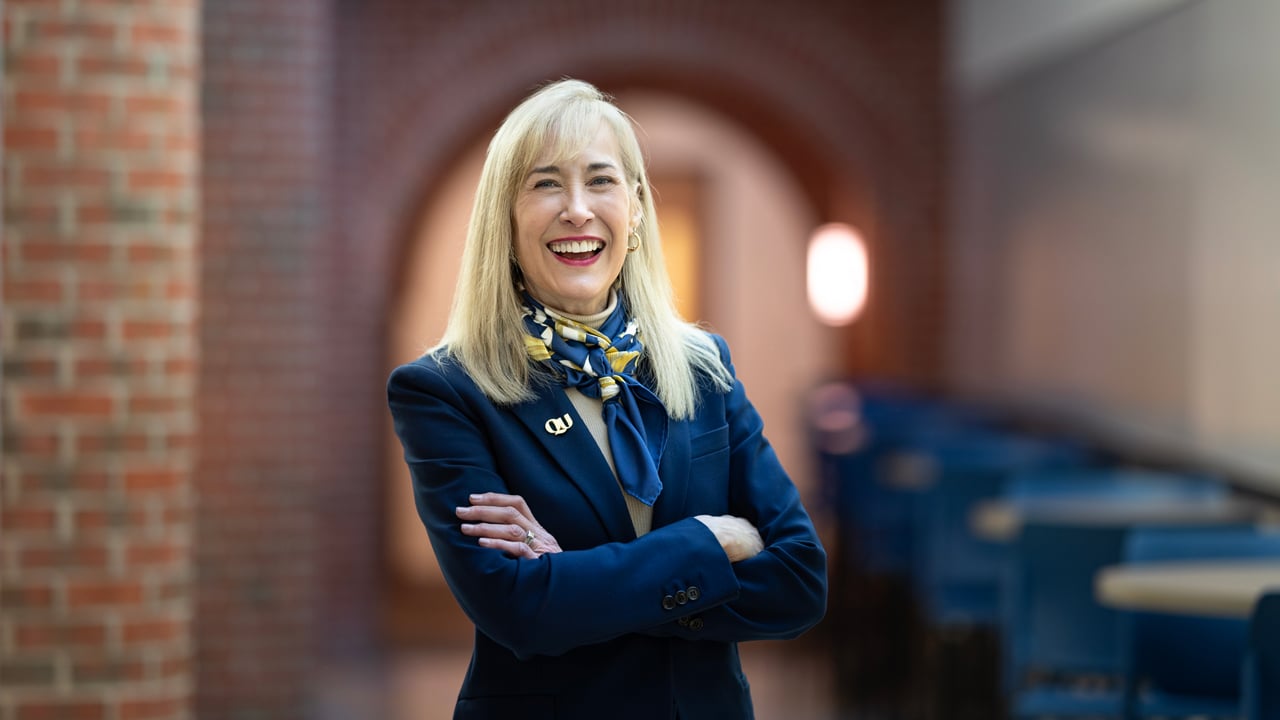 President Marie Hardin smiles